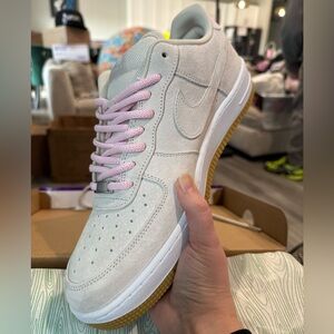 Nike White Sneakers with Pink Accents